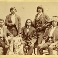 Group portrait of five men
